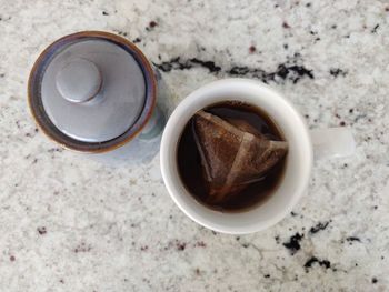 High angle view of black coffee on table