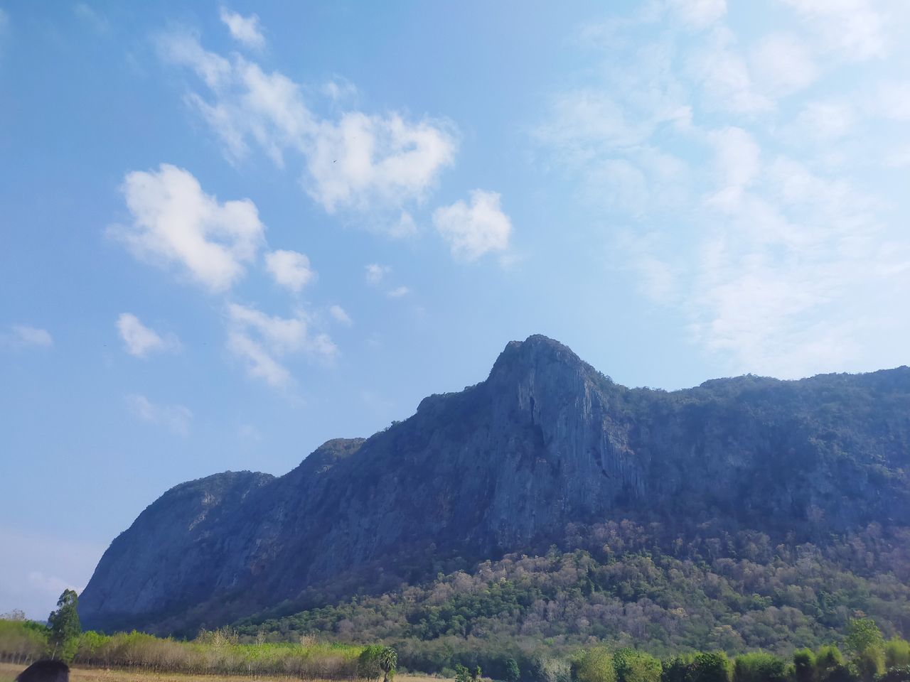 sky, mountain, landscape, environment, cloud, scenics - nature, nature, land, beauty in nature, plant, mountain range, travel destinations, tree, travel, no people, plateau, outdoors, blue, day, non-urban scene, tranquility, tourism, tranquil scene, rural area, valley, rural scene, grass, water, panoramic