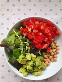 High angle view of chopped fruits in bowl on table