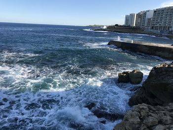 Scenic view of sea against clear sky