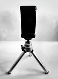 Close-up of camera on table