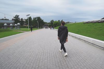 People walking on street at park