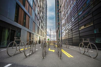 Bicycle sculptures in front of building