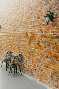 Shadow of street light on brick wall