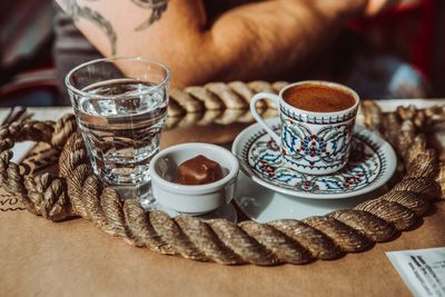 Close-up of coffee cup on table