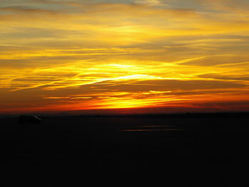 Scenic view of dramatic sky during sunset