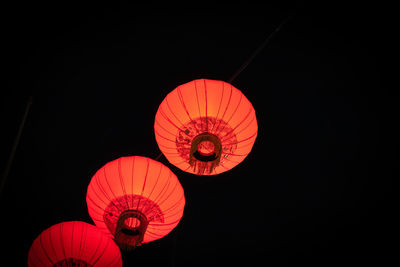 Low angle view of illuminated chandelier
