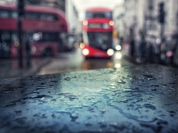 Wet car on road during rainy season