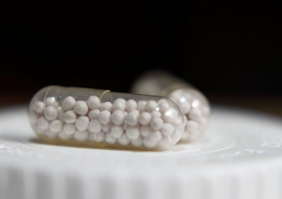 Close-up of eggs on table against black background