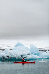 Scenic view of frozen sea against sky