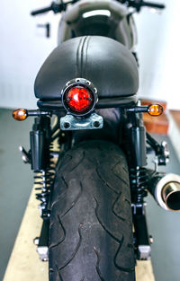 Close-up of bicycle parked on road