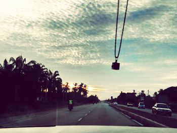 Road against cloudy sky