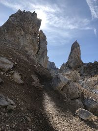 Rock formation on land against sky