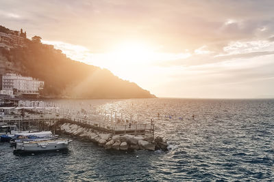 Scenic view of sea at sunset