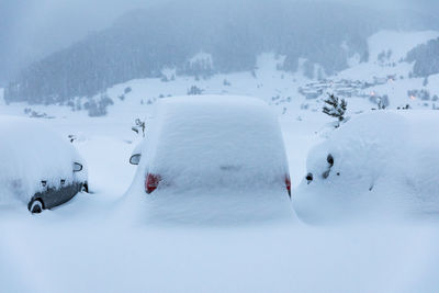 People on snow covered mountain