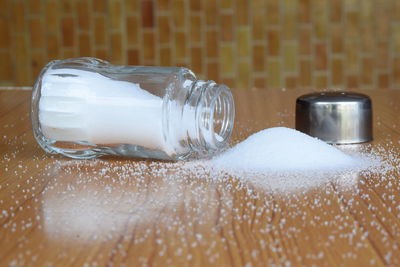 Close-up of drinking glass on table