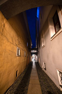 Narrow alley along buildings