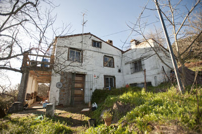 Low angle view of old building against sky