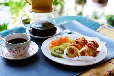 Close-up of coffee served on table
