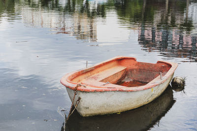 High angle view of abandoned boat moored at lake