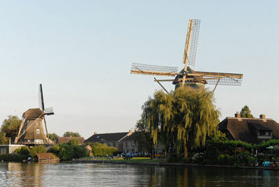 Traditional windmill against clear sky