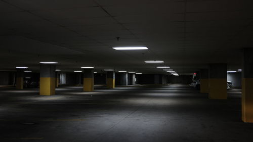 Empty illuminated subway station