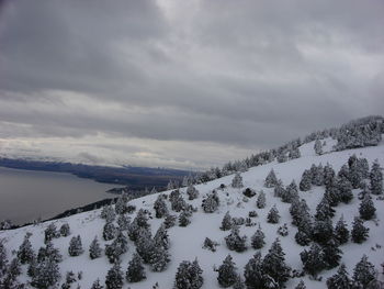 Scenic view of frozen lake against sky