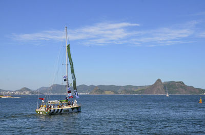 Sailboat sailing in sea