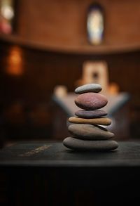 Close-up of stone stack on table