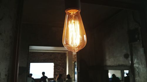 Close-up of illuminated light bulb