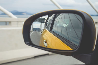 Close-up of vintage car on side-view mirror