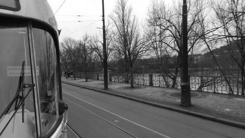 Cars on road against sky