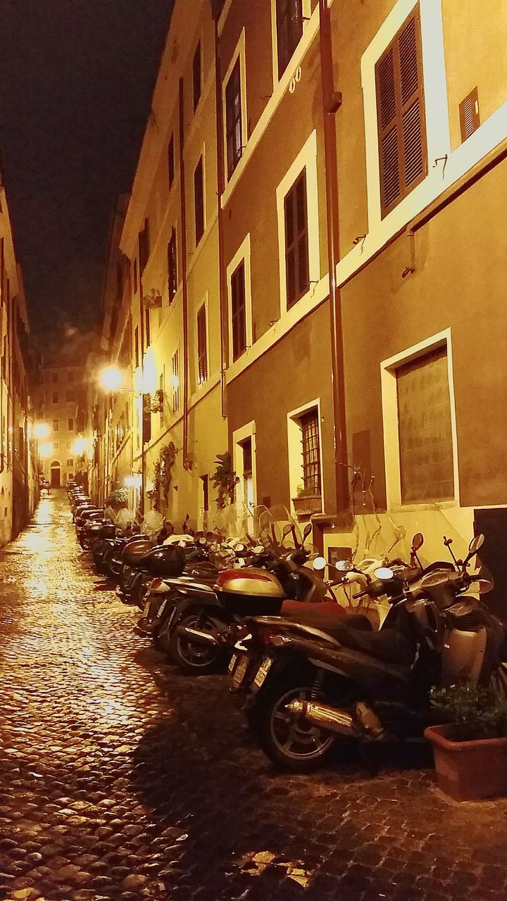 CARS ON STREET AT NIGHT