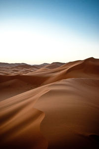 View of desert against clear sky