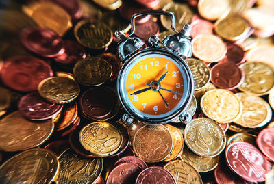 High angle view of coins on table