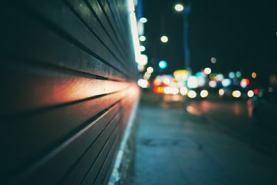 Blurred motion of car on road in city at night