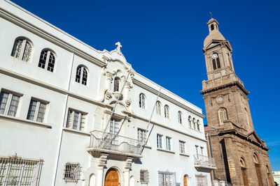 Cathedral of la serena by building against clear blue sky