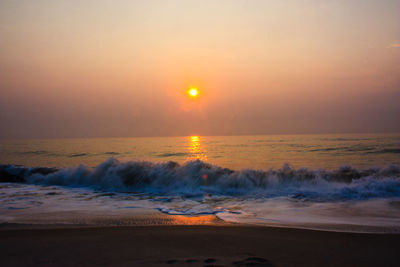 Scenic view of sea against sky during sunset