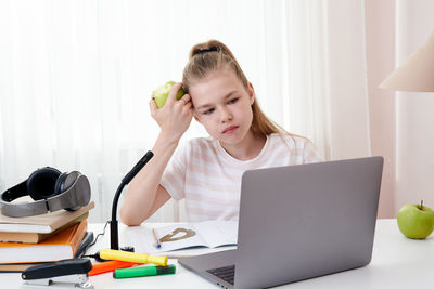 Girl attending online class