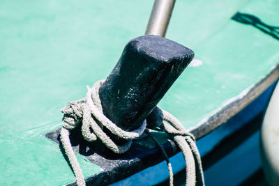 Close-up of rope tied to boat