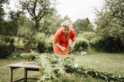 Woman preparing maypole