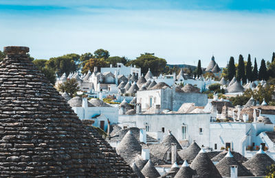 Cone shaped roof tops of trulli in alberobello, italy