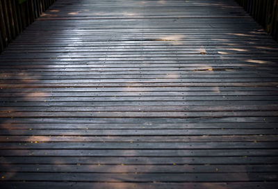 High angle view of wooden boardwalk
