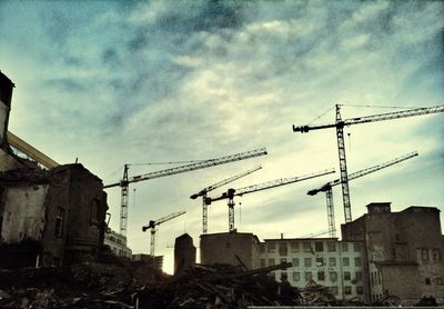 Low angle view of building against cloudy sky