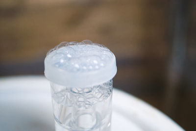 Close-up of water in glass on table