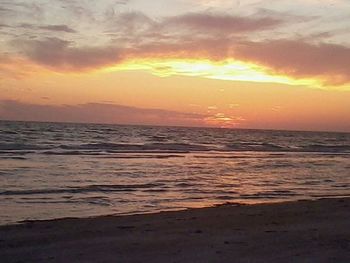 Scenic view of sea at sunset