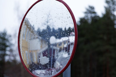 Traffic mirror in a winter residential area in umea
