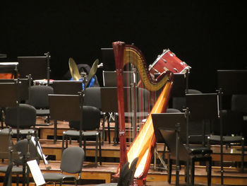 Harp and chairs on stage 