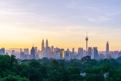 View of buildings against sky during sunset