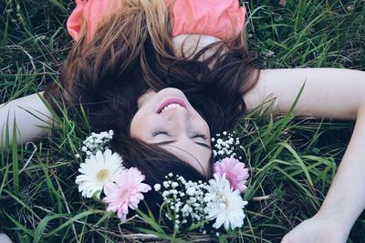 Pink flowers in field